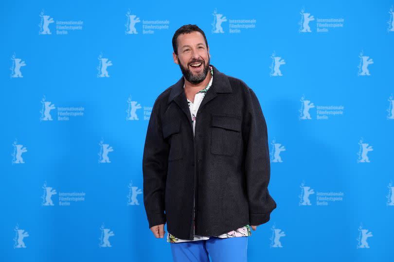 Adam Sandler poses at the "Spaceman" photocall during the 74th Berlinale International Film Festival Berlin