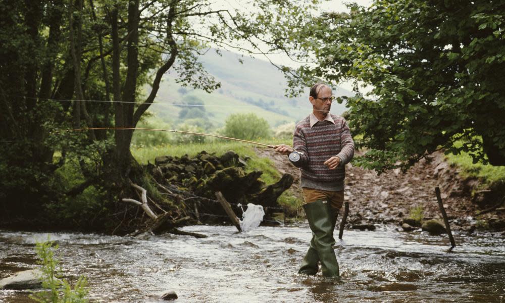 Nicholas Edwards, Lord Crickhowell, fly-fishing on a tributary of the River Usk to the rear of his home in Powys, Wales.