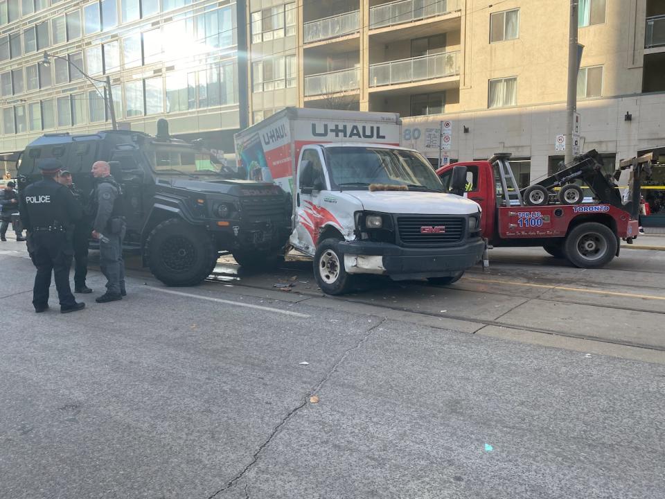 Toronto police at the scene of the arrest of a 47-year-old man downtown on Wednesday. (Grant Linton/CBC - image credit)