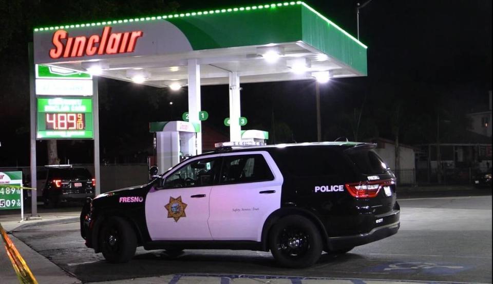 Police investigate a shooting at a gas station near Belmont Avenue and Abby Street on Monday, Oct. 16, 2023.