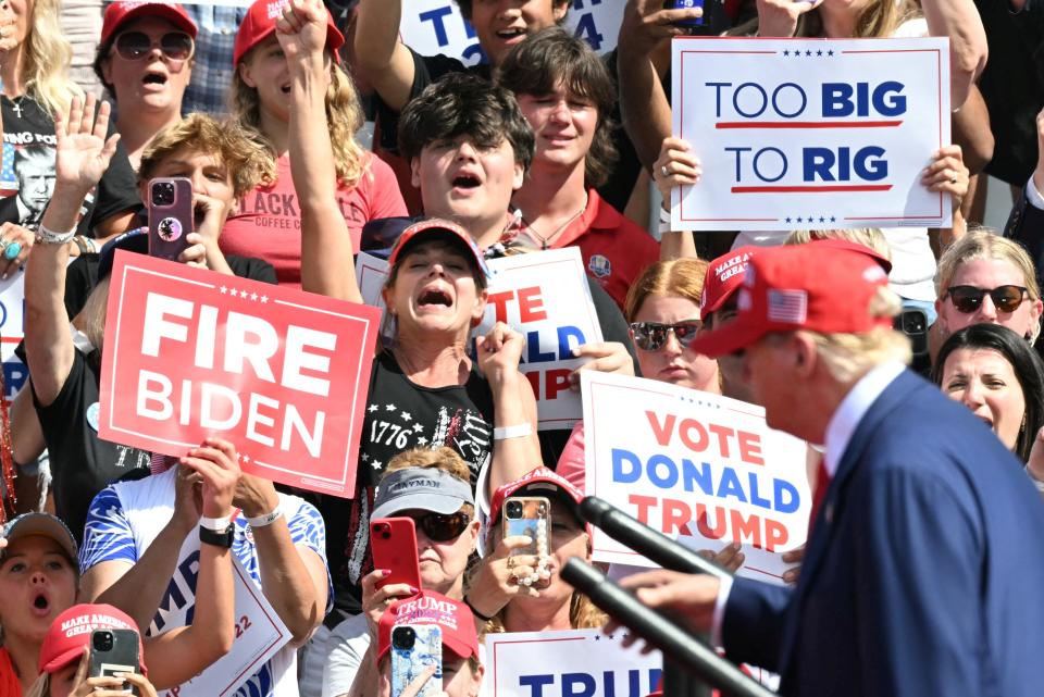 Excited rally-goers greet Donald Trump in Racine, Wisconsin (AFP via Getty Images)