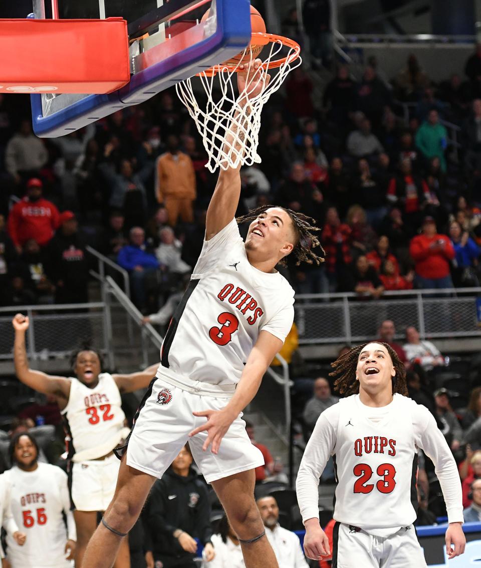 Aliquippa's DJ Walker dunks for the last shot in Saturday's WPIAL Class 2A championship game against Northgate at the Petersen Events Center in Pittsburgh.