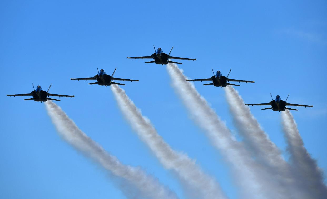The Blue Angels make a formation pass down the length of the runway at Naval Station Mayport on Oct. 19, 2023. The Blue Angels will appear at the Florida International Air Show on Nov 1-2, 2025.