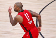 Houston Rockets' P.J. Tucker reacts to his three-point basket during the fourth quarter of Game 2 of an NBA basketball first-round playoff series against the Oklahoma City Thunder, Thursday, Aug. 20, 2020, in Lake Buena Vista, Fla. (Kevin C. Cox/Pool Photo via AP)