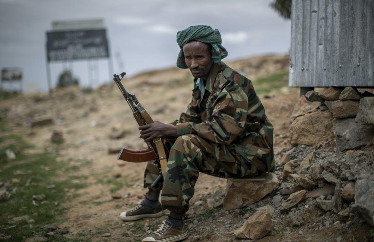 <span class="caption">A fighter loyal to the Tigray People's Liberation Front.</span> <span class="attribution"><a class="link " href="https://newsroom.ap.org/detail/EthiopiaCountingtheDeadVignettes/5d6542eadebb469aacaaf70b18e44696/photo?Query=tigray&mediaType=photo&sortBy=arrivaldatetime:desc&dateRange=Anytime&totalCount=1334&currentItemNo=7" rel="nofollow noopener" target="_blank" data-ylk="slk:(AP Photo/Ben Curtis;elm:context_link;itc:0;sec:content-canvas">(AP Photo/Ben Curtis</a></span>
