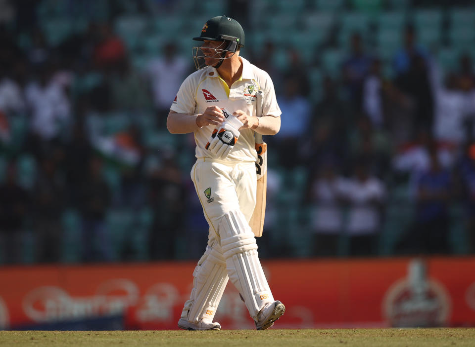 David Warner walks off the pitch in Nagpur.