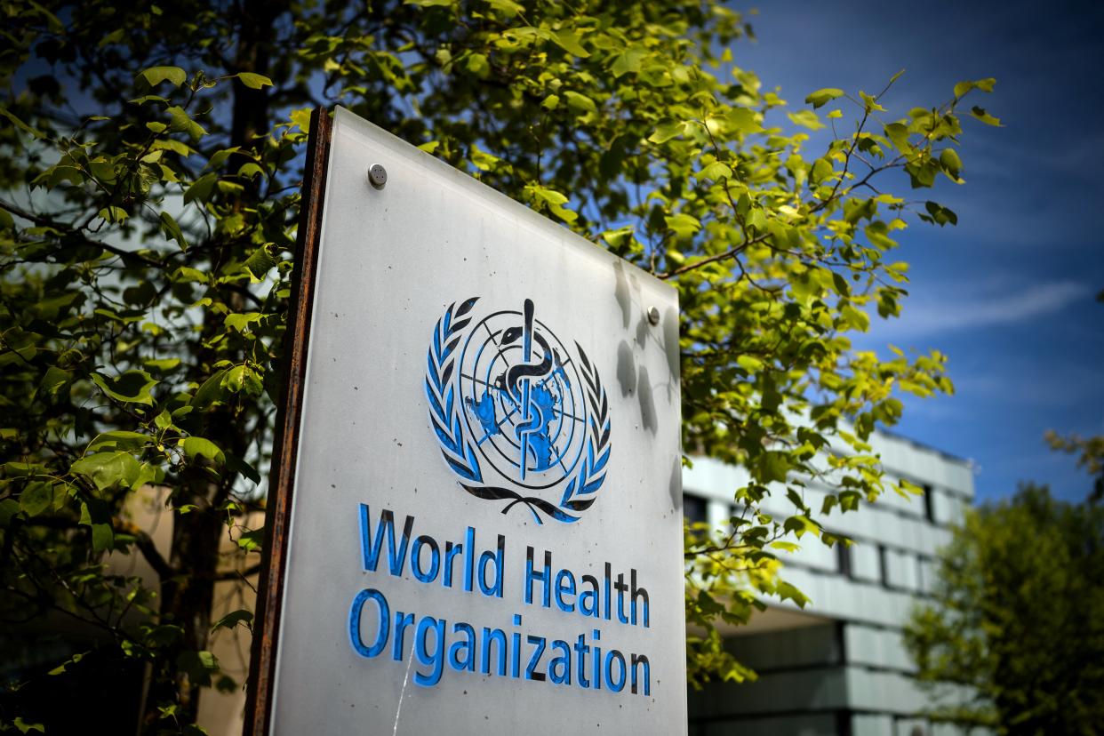 A picture taken on May 8, 2021 shows a sign of the World Health Organization (WHO) at the entrance of their headquarters in Geneva amid the Covid-19 coronavirus outbreak. (Photo by Fabrice COFFRINI / AFP) (Photo by FABRICE COFFRINI/AFP via Getty Images)