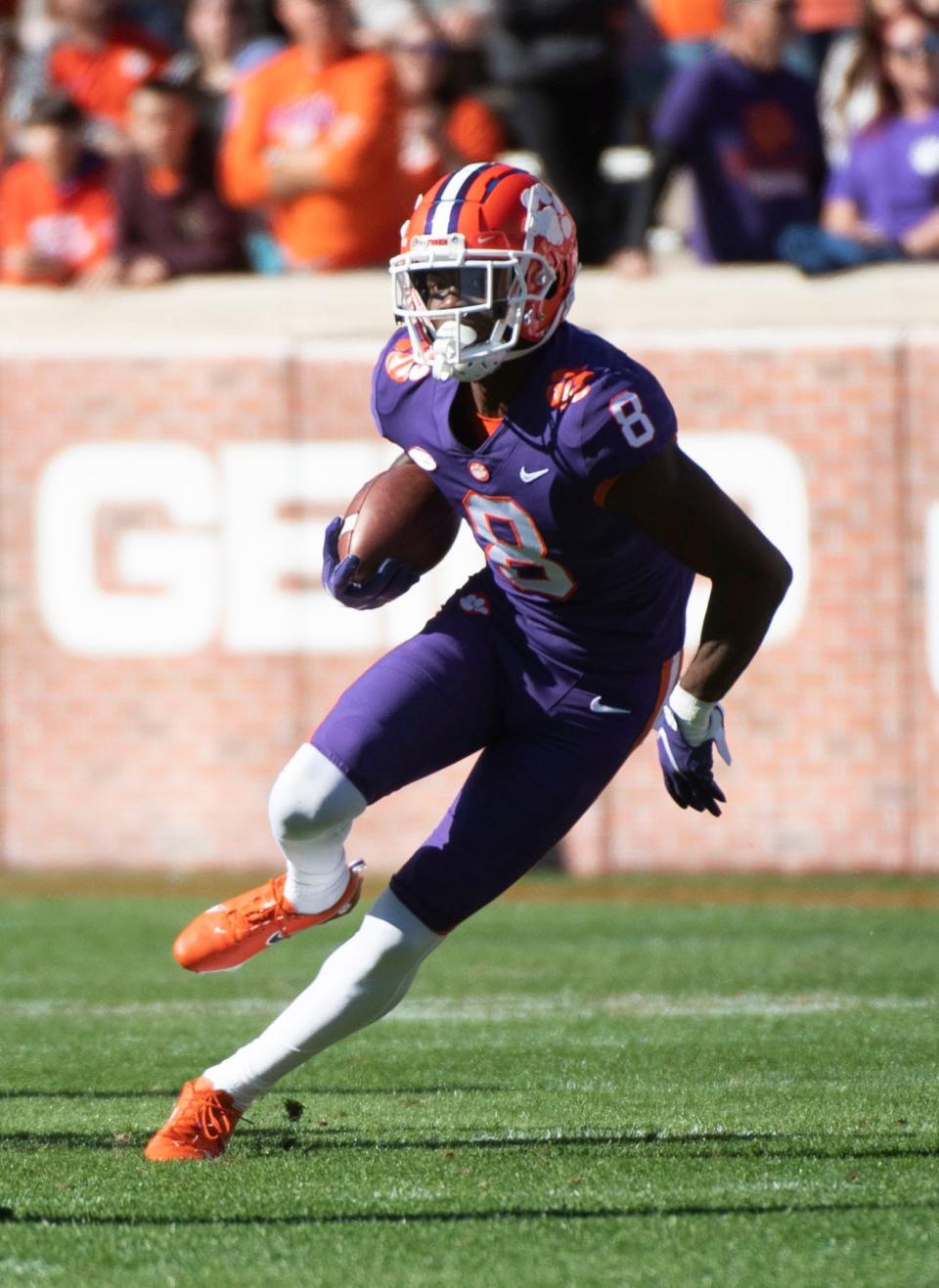 Clemson Tigers wide receiver Justyn Ross (8) takes the ball down the field while playing against Connecticut Huskies at Memorial Stadium Saturday, Nov. 13, 2021.