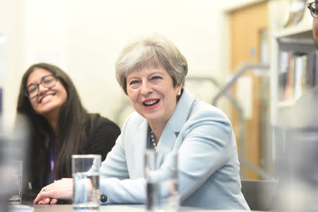 Britain's Prime Minister Theresa May visits the Featherstone High School in Southall in London, Britain, Febuary 19, 2018. REUTERS/Jeremy Selwyn/Pool