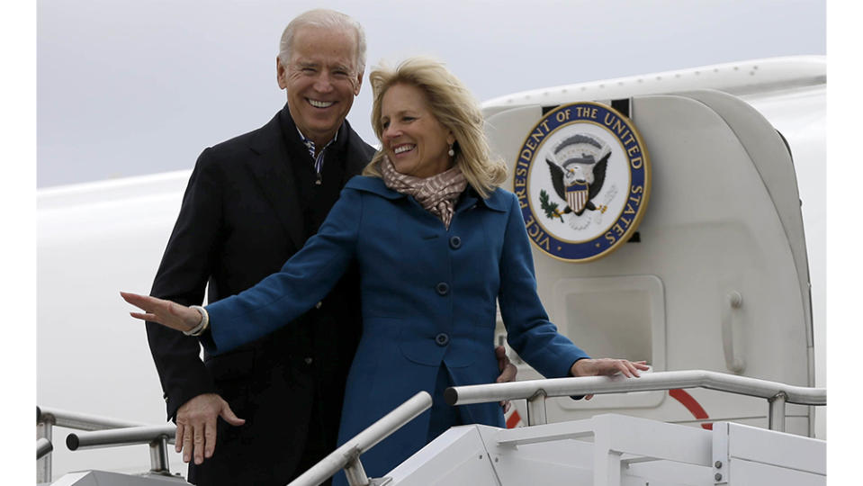 Vice President Joe Biden, accompanied by his wife Jill Biden, board Air Force Two, Tuesday, Nov. 6, 2012, at a Delaware Air National Guard Base in New Castle , Del., en route to Chicago. (AP Photo/Matt Rourke)