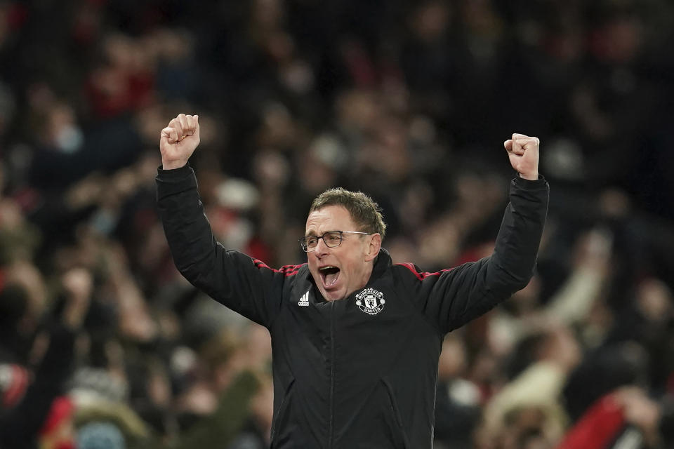 Manchester United's manager Ralf Rangnick celebrates after Marcus Rashford scored his side's first goal during the English Premier League soccer match between Manchester United and West Ham at Old Trafford stadium in Manchester, England, Saturday, Jan. 22, 2022. (AP Photo/Dave Thompson)