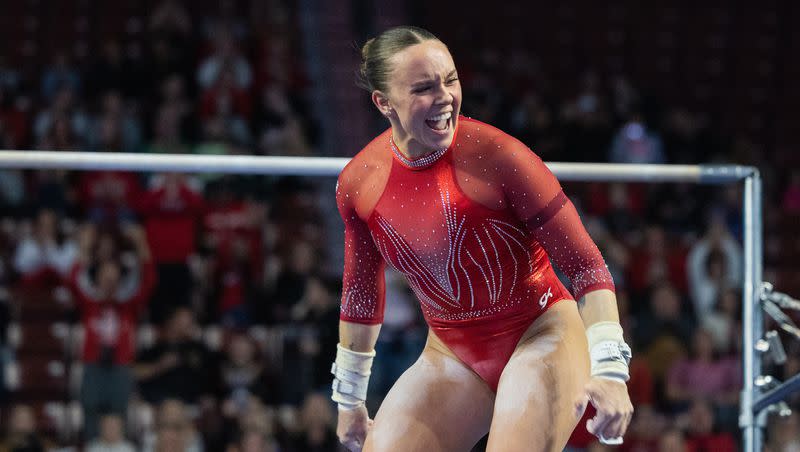 Utah’s Maile O’Keefe celebrates after performing her bars routine during the Pac-12 Gymnastics Championships at the Maverik Center in West Valley City on March 18, 2023.