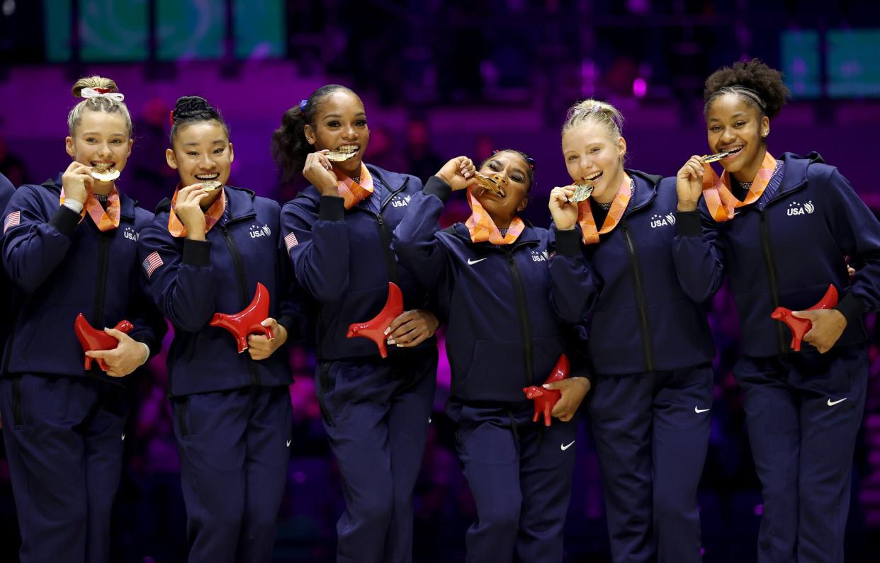 Gold medalists team USA pose during the awarding ceremony of the women's team event at the 51st FIG Artistic Gymnastics World Championships in Liverpool, Britain, Nov. 1, 2022.