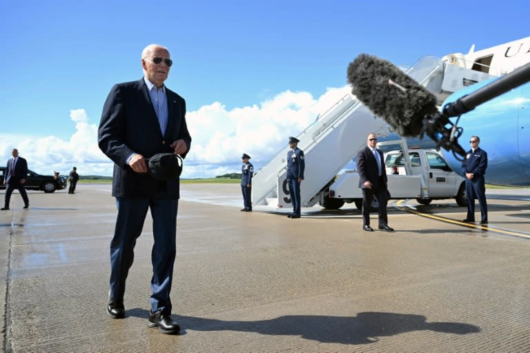 US President Joe Biden walks to speak with the press before boarding Air Force One prior to departure from Dane County Regional Airport in Madison (SAUL LOEB)