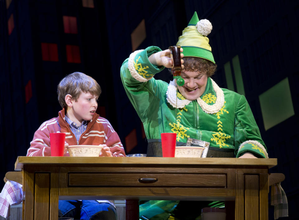 This theater image released by The Hartman Group shows Mitchell Sink, left, and Jordan Gelber during a performance of the musical "Elf," in New York. (AP Photo/The Hartman Group, Joan Marcus)