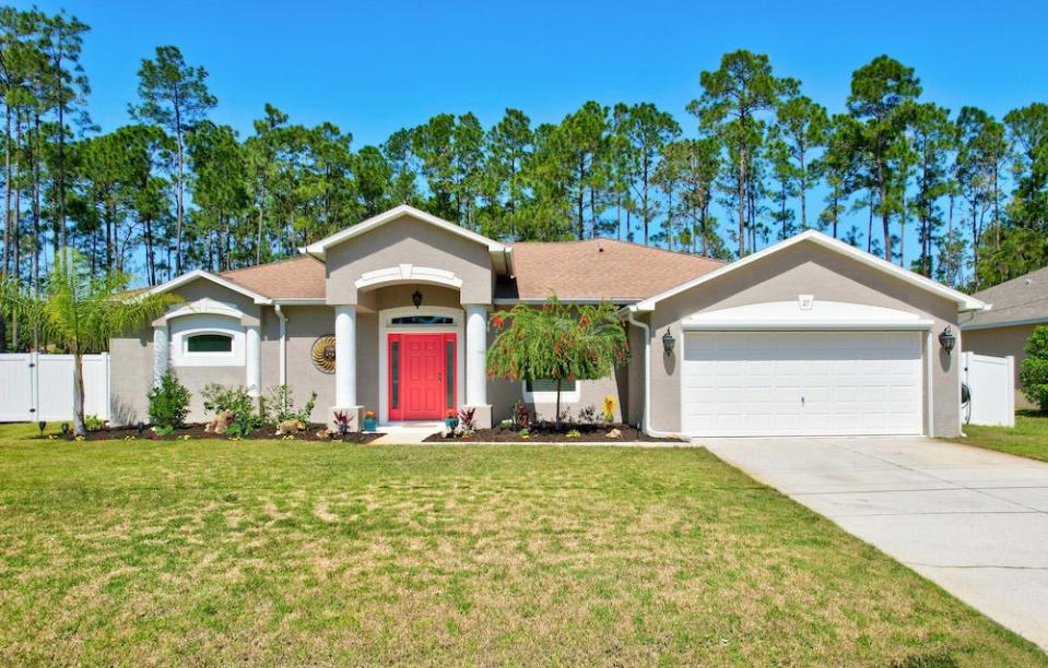 Beautiful curb appeal is just the beginning of the details that make this half-million-dollar custom-built estate in Palm Coast a standout on the market.