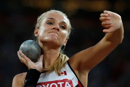 Canada's Brianne Theisen-Eaton competes in the shot put event of the women's heptathlon during the 15th IAAF World Championships at the National Stadium in Beijing, China, August 22, 2015. REUTERS/Phil Noble