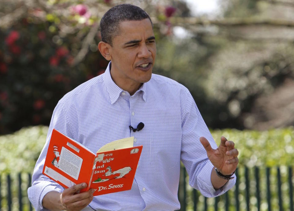 Barack Obama President Barack Obama reads "Green Eggs and Ham" by Dr. Seuss as he hosts the annual White House Easter Egg Roll, on the South Lawn of the White House in WashingtonObama Easter Egg Roll, Washington, USA