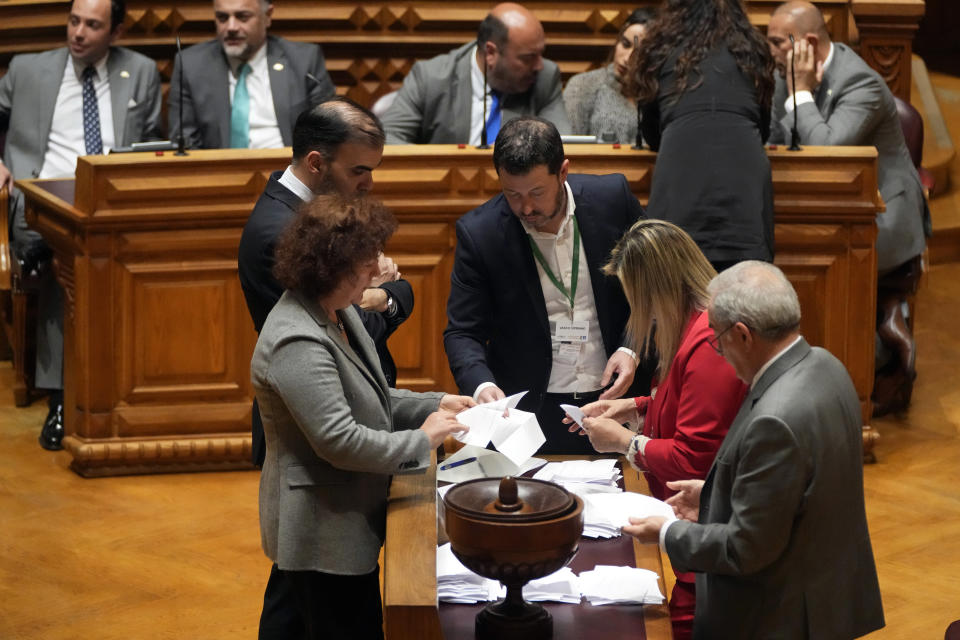 Members of parliament count votes to elect the house speakerat the parliament in Lisbon, Wednesday, March 27, 2024. Portugal's newly-elected Parliament Wednesday voted in a new house speaker following a deal between the country's two main centrist parties. (AP Photo/Armando Franca)