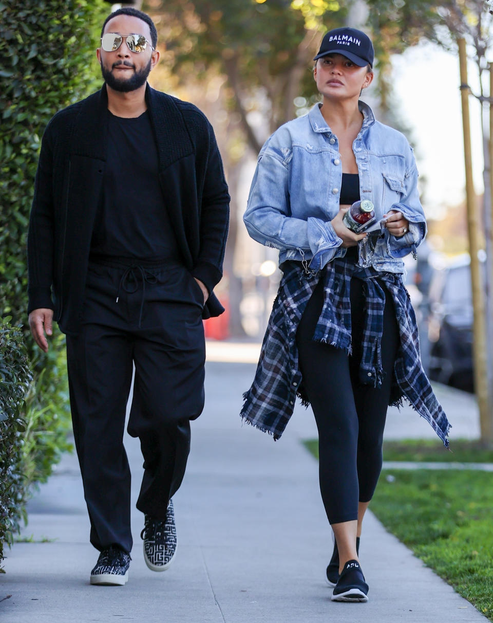 <p>In Beverly Hills, Chrissy Teigen and husband John Legend head to a spa on Jan. 11. </p>