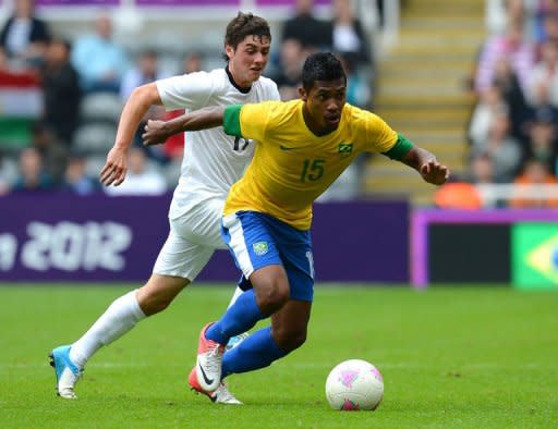 Brazil's defender Alex Sandro (R) vies with New Zealand's forward Marco Rojas during the London 2012 Olympic Games men's football match between Brazil and New Zealand at St James' Park in Newcastle, north-east England. Brazil beat New Zealand 3-0