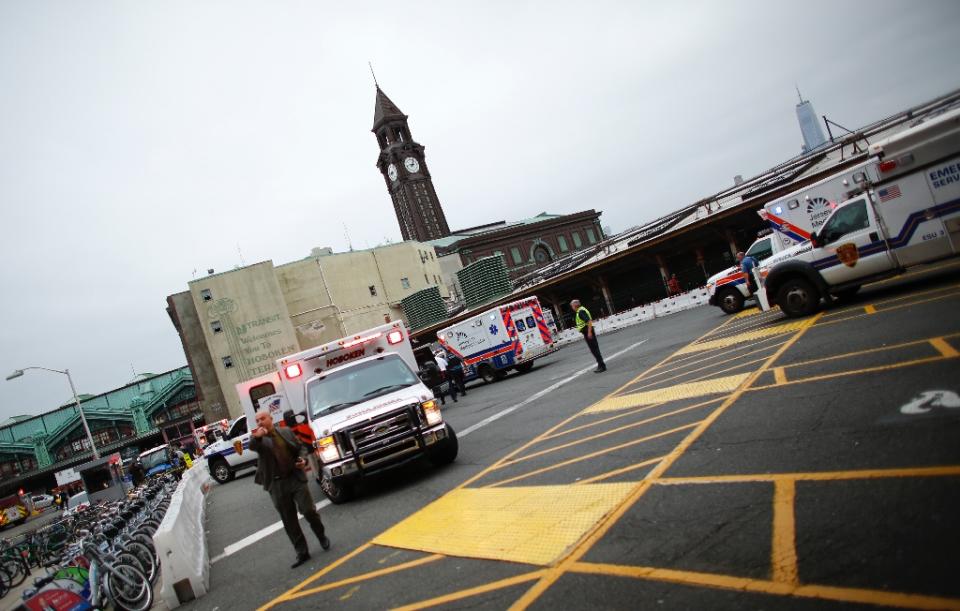 <p>Emergency workers arrive at New Jersey Transit’s rail station in Hoboken, New Jersey on September 29, 2016 (AFP Photo/Kena Betancur) </p>