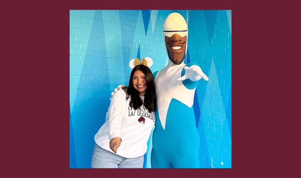 Allyson Garcia, a sophomore communication disorders major from Lubbock, won an Instagram contest for a photo she took with the superhero Frozone from “The Incredibles” while wearing a WT sweatshirt at Walt Disney World in Orlando.