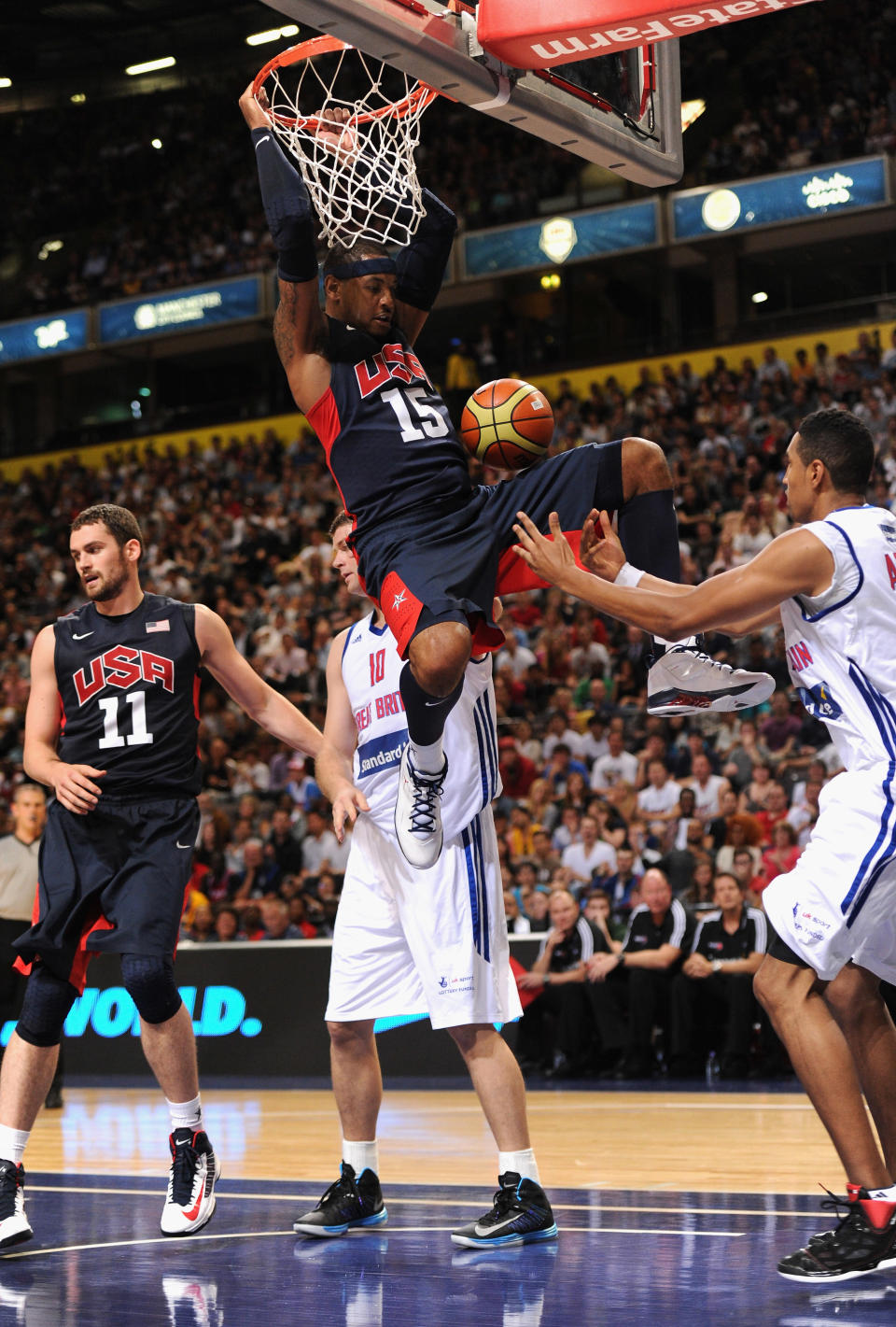 MANCHESTER, ENGLAND - JULY 19: USA player Carmelo Anthony scores a basket during the Men's Exhibition Game between USA and Team GB at Manchester Arena on July 19, 2012 in Manchester, England. (Photo by Stu Forster/Getty Images)