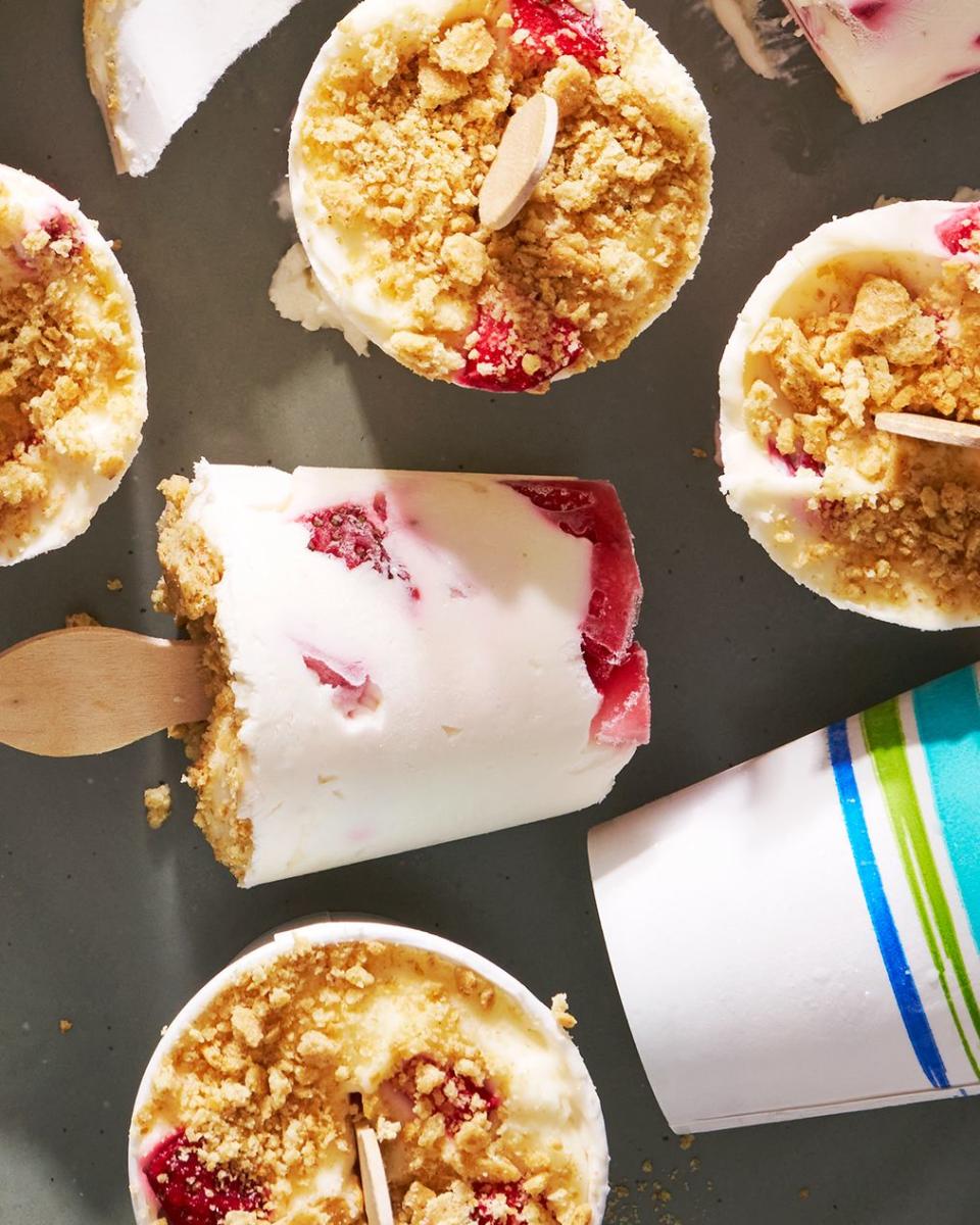 cheesecake pops with a strawberry swirl and crumble topping