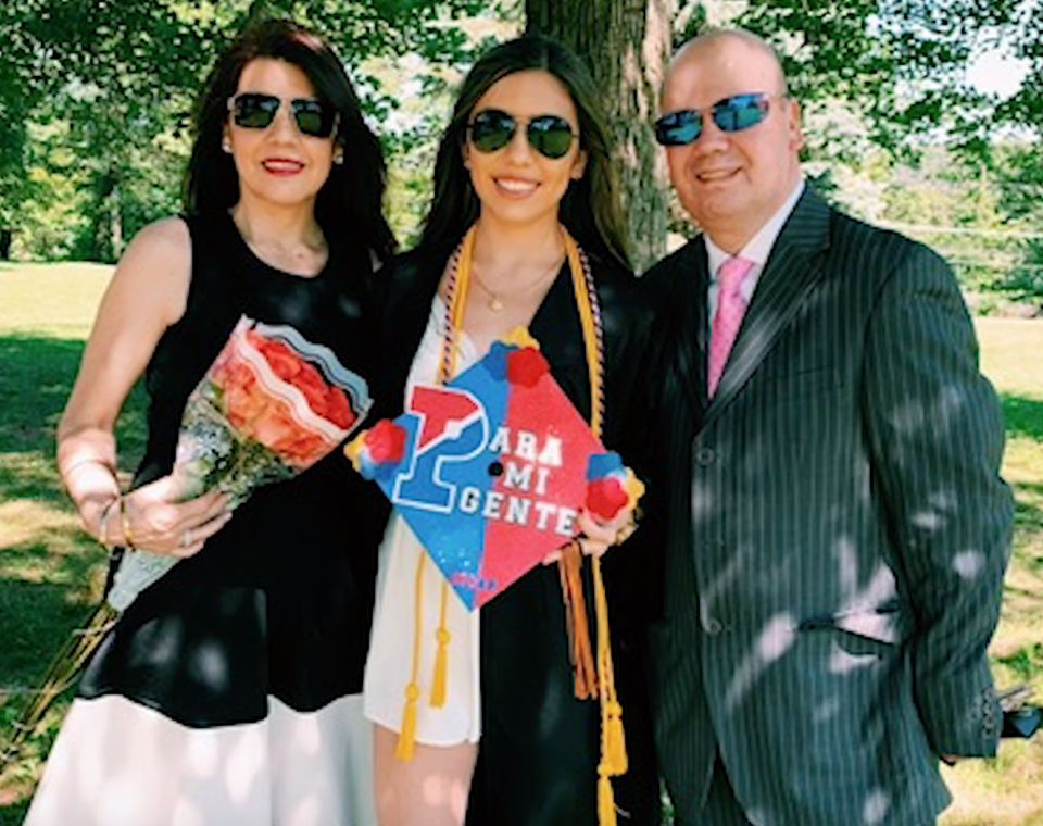 Michelle Mahecha Perez poses alongside her Mother and Father.