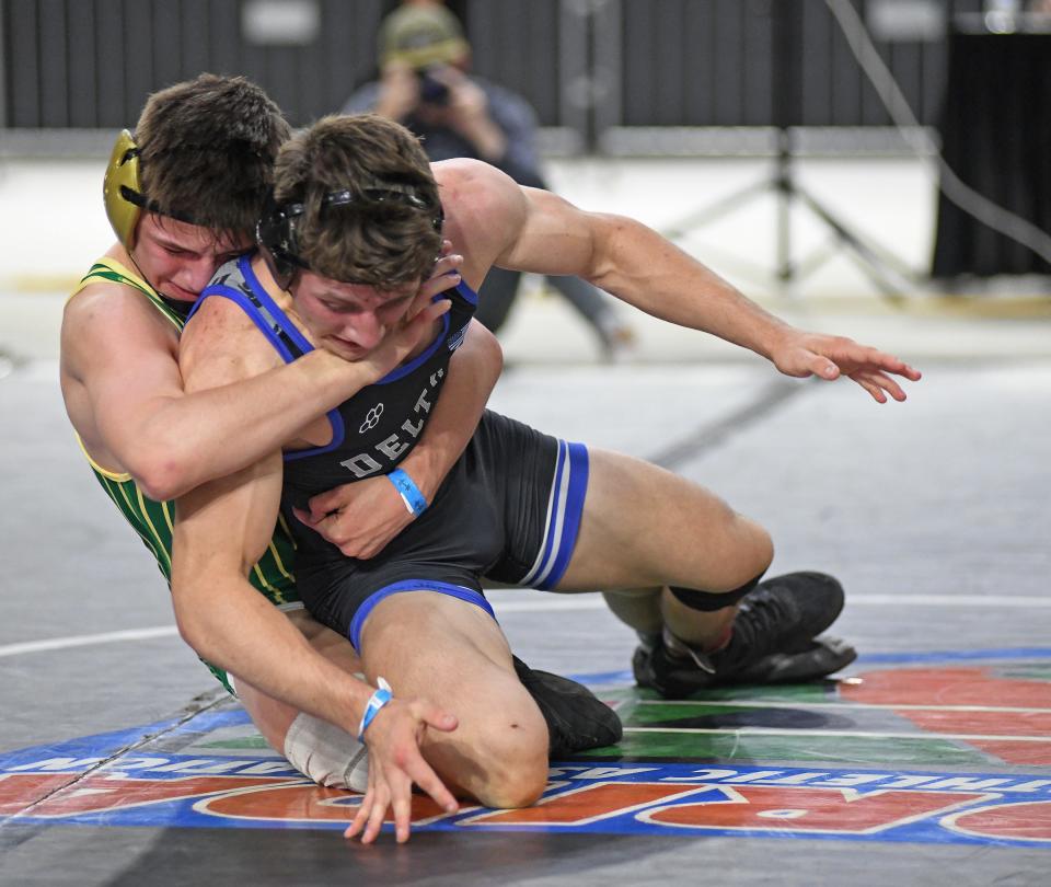 Deltona's Kevin Kerns tries to shake Fleming Island's Bryce Paridon during their Class 2A 132-pound final Saturday, March 4, 2023, at the FHSAA State Wrestling Championships at the Silver Spurs Arena in Kissimmee.