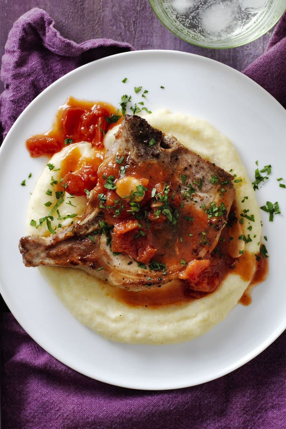 Pork Chops and Garlicky Tomatoes with Parmesan Polenta