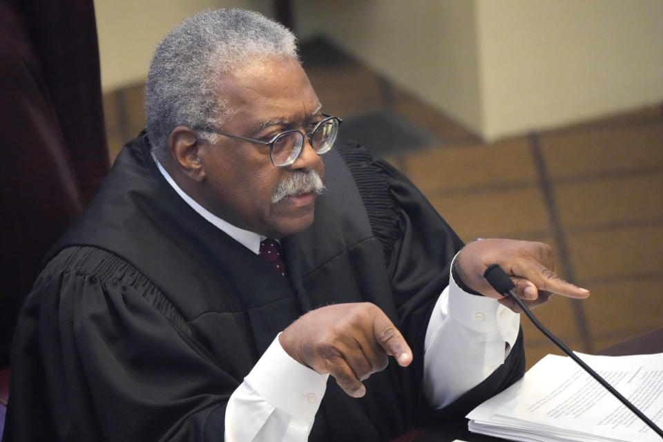 Presiding Justice Leslie King of the Mississippi Supreme Court questions of attorneys arguing over a state law that would put $10 million of federal pandemic relief money into infrastructure grants for private schools, Tuesday, Feb. 6, 2024, in Jackson, Miss. (AP Photo/Rogelio V. Solis)