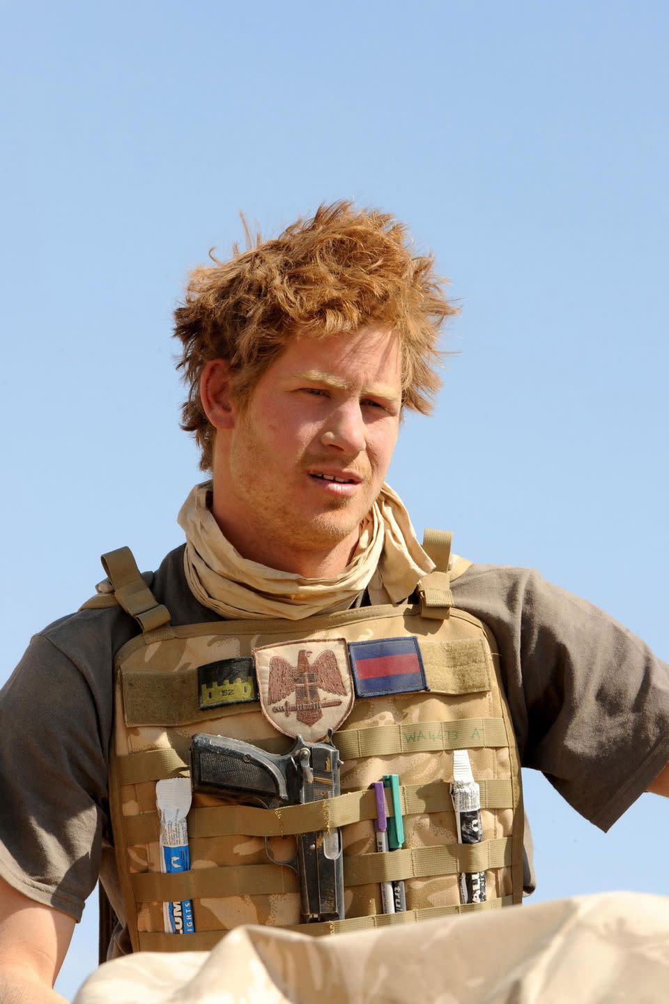 <p>Prince Harry is photographed on an armored vehicle in the desert of Afghanistan during his time in the Royal Military Academy. </p>