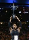 Tennis - Australian Open - Melbourne Park, Melbourne, Australia - 28/1/17 Serena Williams of the U.S. holds up her trophy after winning her Women's singles final match against Venus Williams of the U.S. .REUTERS/Issei Kato