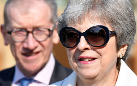 Britain's Prime Minister, Theresa May, and her husband Philip visit the RHS Chelsea Flower Show in London, Britain May 21, 2018. REUTERS/Toby Melville