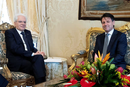 Italian President Sergio Mattarella meets Giuseppe Conte at the Quirinale Palace in Rome, Italy, May 23, 2018. Italian Presidential Press Office/Handout via REUTERS