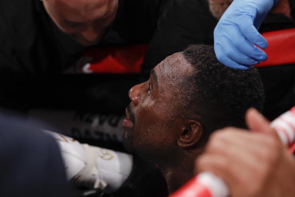 Canada's Steve Rolls talks to his corner after a super middleweight boxing match against Kazakhstan's Gennady Golovkin on Saturday, June 8, 2019, in New York. Golovkin won in the fourth round. (AP Photo/Frank Franklin II)