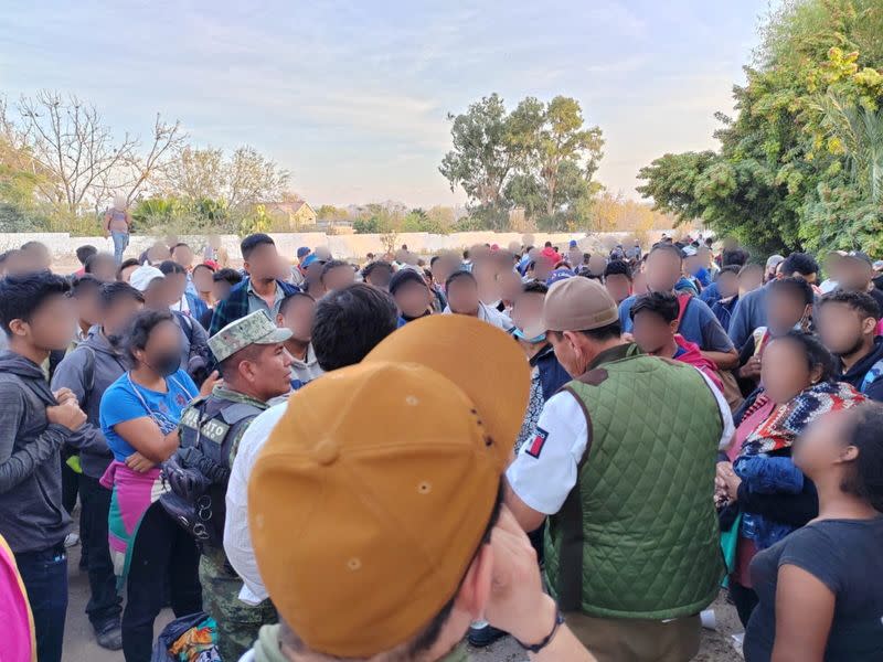 Kidnapped migrants gather after a rescue operation, in Ciudad Lerdo