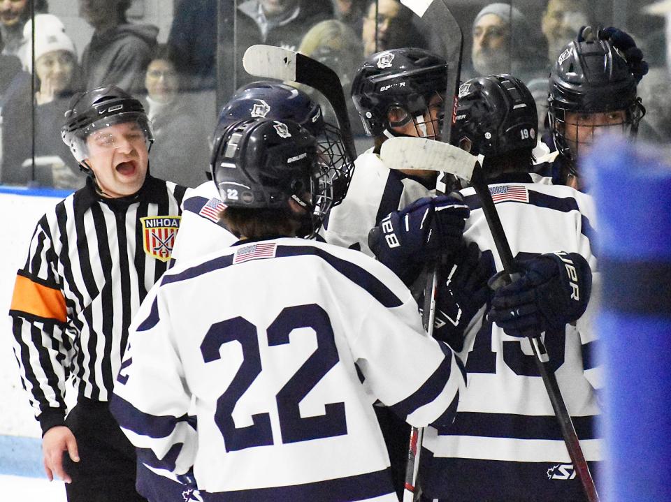 Somerset Berkley's Kein Stafford celebrates with teammates after scoring during the Division 3 Round of 32 contest at Driscoll Ice Arena in Fall River Feb. 28, 2024. Stafford had a goal and an assist in Sunday's win over Essex North Shore.