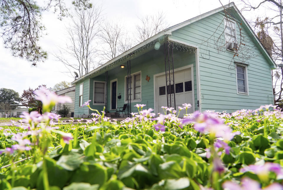 A home is shown in Galena Park, Texas, Sunday, Feb. 19, 2023, where, according to Harris County Sheriff Ed Gonzalez, a man killed three teenaged girls and himself on Saturday night. (Mark Mulligan/Houston Chronicle via AP)