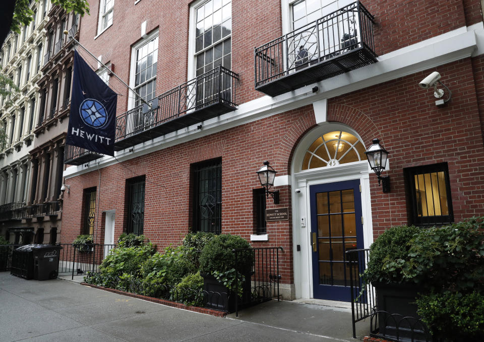 This July 11, 2019, photo, shows the Hewitt School, an all-girls' school located blocks from Financier Jeffrey Epstein's Upper East Side mansion in New York. In the decade since striking a plea deal that required Epstein to register as a child sex offender, he has sought to underwrite all manner of youth causes, such as a baseball program and the school. Some donations, including $15,000 to the school, were returned once recipients learned where they came from. (AP Photo/Kathy Willens)