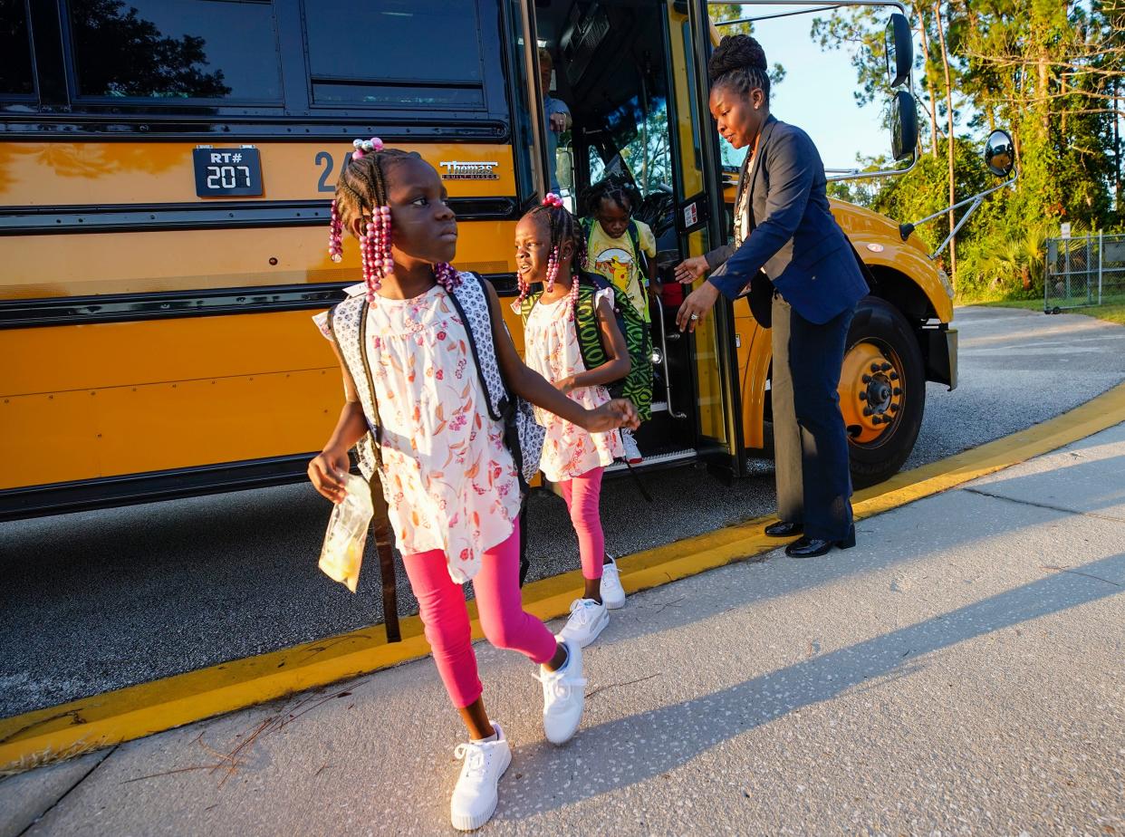 Horizon Elementary school principal Melani Johnson greets students as they arrive for the first day back to school at Horizon Elementary in Port Orange, Monday, Aug. 14, 2023. 