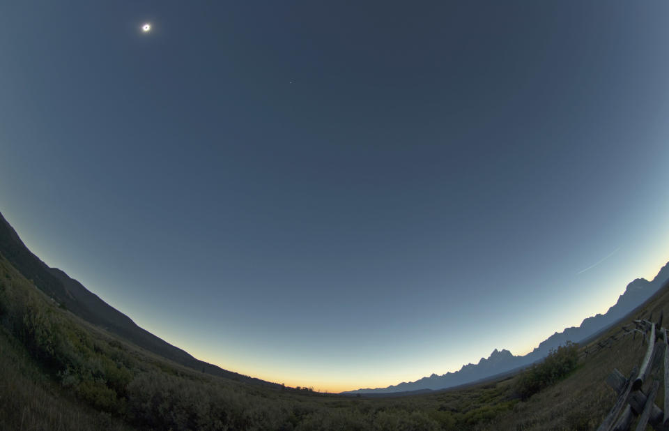 The sun is is in full eclipse over Grand Teton National Park outside Jackson, Wyoming.&nbsp;