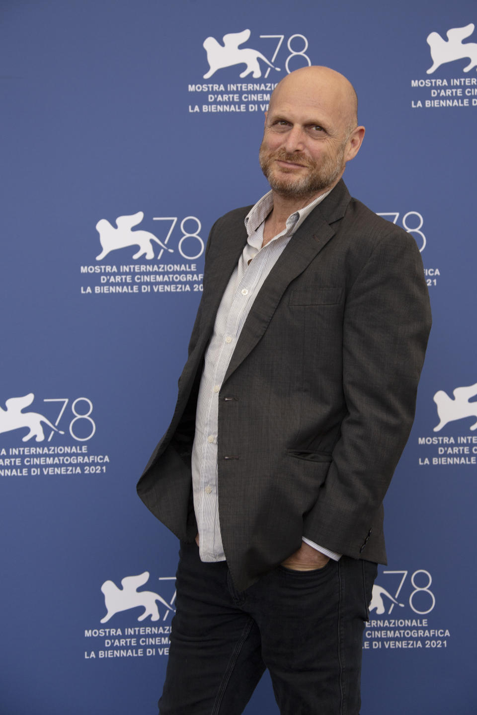 Hagai Levi poses for photographers at the photo call for the film 'Scenes of a Marriage' during the 78th edition of the Venice Film Festival in Venice, Italy, Saturday, Sep, 4, 2021. (Photo by Joel C Ryan/Invision/AP)