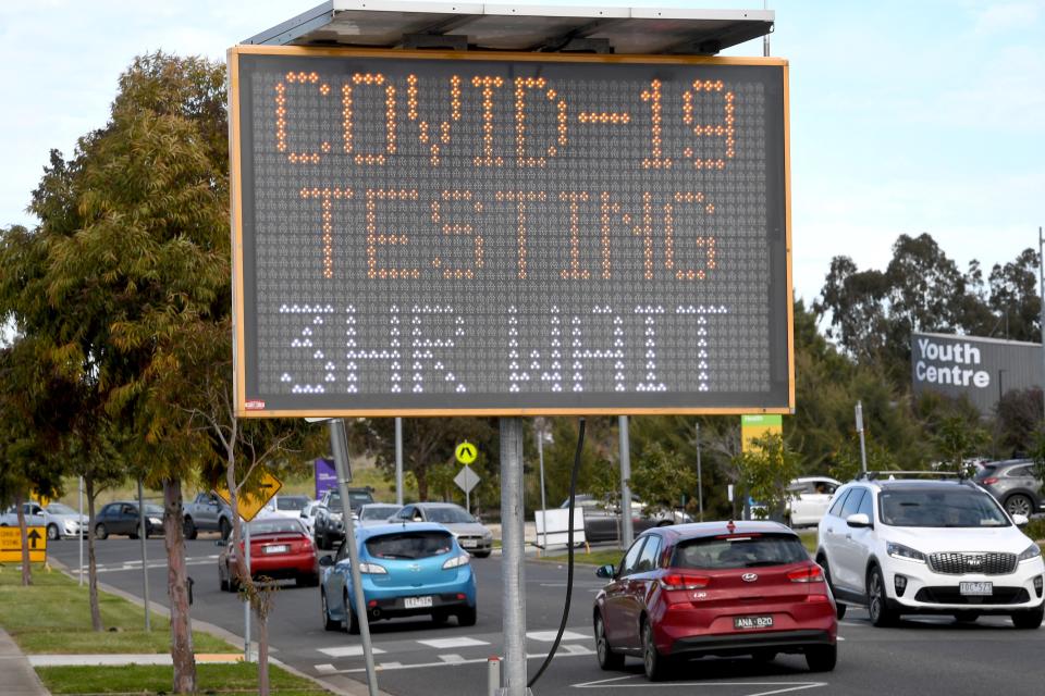 People queue in their cars for a Covid-19 test in the outer Melbourne suburb of Melton on August 10, 2021. (Photo by William WEST / AFP) (Photo by WILLIAM WEST/AFP via Getty Images)