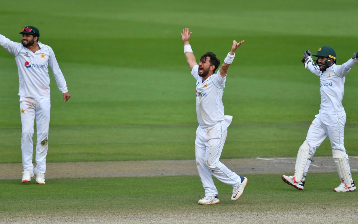 Pakistan's Yasir Shah, center, captain Azhar Ali, left, and Mohammad Rizwan appeal unsuccessfully for the wicket of England's Jos Buttler - Getty Pool 