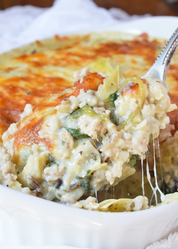 <p><a href="https://wonkywonderful.com/turkey-spinach-artichoke-wild-rice-casserole/" rel="nofollow noopener" target="_blank" data-ylk="slk:Wonky Wonderful;elm:context_link;itc:0;sec:content-canvas" class="link ">Wonky Wonderful</a></p>