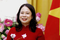 FILE - Vietnamese Vice President Vo Thi Anh Xuan shakes hands with Japanese Crown Prince Akishino, not shown, at the Presidential Palace in Hanoi, Vietnam, on Sept. 21, 2023. Xuan will serve as acting President after former President Vo Van Thuong resigned, after a little over a year in the position, amid an intense anti-corruption campaign, according to party mouthpiece Tuoi Tre. (AP Photo/Minh Hoang, File)