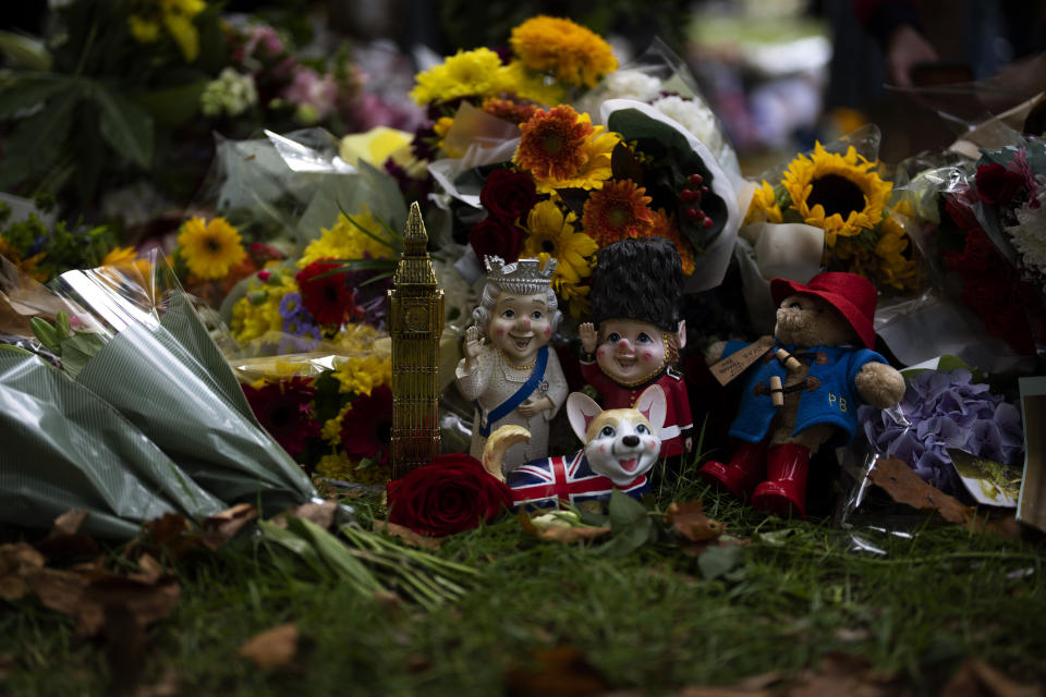 Flowers and items for Queen Elizabeth II are seen at the Green Park memorial, near Buckingham Palace, in London, Sept. 10, 2022. (AP Photo/Emilio Morenatti)